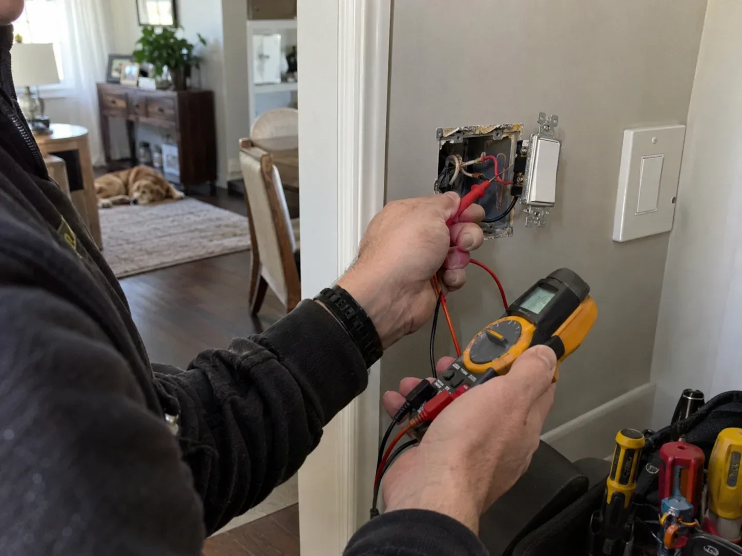 Electrician diagnosing electrical problems in Stoney Creek home